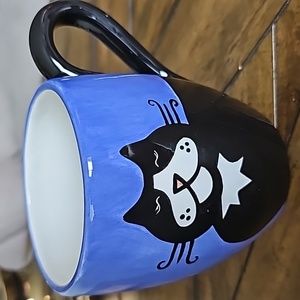 Laurie Veasey mug never used. Small chip on handle. Signed